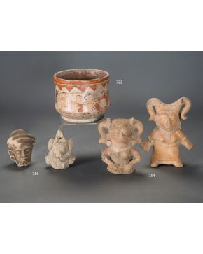 754-Pareja de caras de mujer en cerámica. Cultura Maya. Periodo Postclásico. 850-900 D.C.