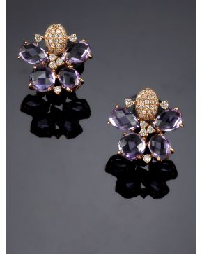 303-ELEGANTES PENDIENTES DE BRILLANTES Y AMATISTAS. sobre una montura de oro rosa de 18k.