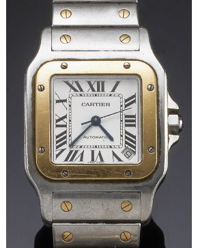 1037-RELOJ DE PULSERA CARTIER MODELO SANTOS.CAJA Y BRAZALETE EN ACERO Y ORO AMARILLO DE 18K. MOVIMIENTO AUTOMÁTICO. Esfera gris con numeración romana y