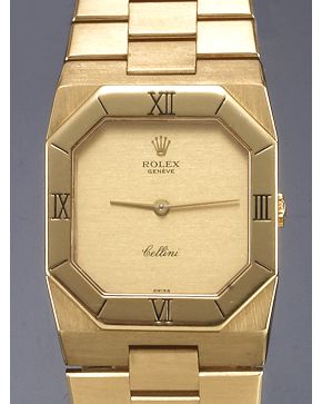 1047-INTERESANTE RELOJ DE COLECCIÓN ROLEX GENEVE MODELO CELLINI. AÑOS 80. CAJA Y BRAZALETE EN ORO AMARILLO MATE DE 18K. CON NUMERACIÓN ROMANA EN EL BIS