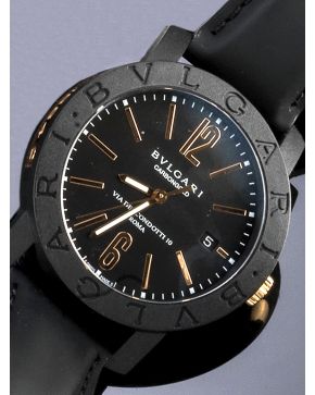 1054-SOFISTICADO RELOJD E PULSERA BULGARI MODELO CARBONGOLD EDICIÓN ROMA. CAJA EN CARBONO NºL32855. MOVIMIENTO AUTOMÁTICO. MAQUINARIA VISTA POR DETRÁS.