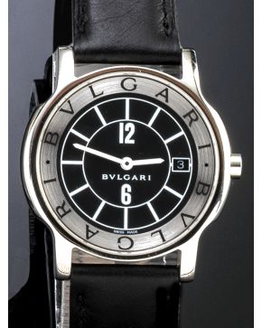 1055-RELOJ DE PULSERA BULGARI MODELO SOLOTEMPO. CAJA EN ACERO. Nº D30932. MOVIMIENTO SUIZO DE CUARZO. Esfera negra con numeración a trazos aplicados y 