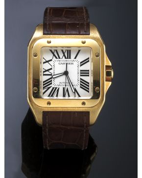 880-IMPORTANTE CARTIER MODELO SANTOS 100. GRAN CAJA EN ORO AMARILLO MATE DE 18K. Nº 292256CE Y BISEL ATORNILLADO EN ORO BRILLO. MOVIMIENTO AUTOMÁTICO.