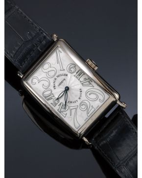 1060-RELOJ DE PULSERA FRANCK MULLER. MODELO CRAZY HOURS 1200CH. Nº 794 CON MONTURA EN ORO BLANCO.