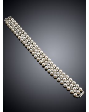 252A-ELEGANTE BRAZALETE DE PERLAS CULTIVADAS Y BRILLANTES.