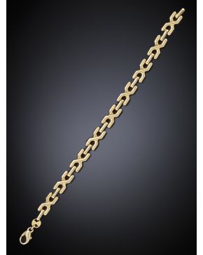 184-PULSERA MODERNA DE ESLABONES ENTRELAZADOS EN ORO AMARILLO 18K.