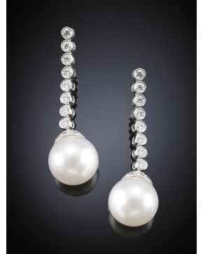 708-PENDIENTES LARGOS DE BRILLANTES Y PERLAS. Peso de los brillantes 0.81ct.