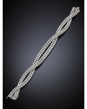 685-PULSERA DE BRILLANTES CON UN PESO TOTAL DE 12.23CT.. COLOR H-K. PUREZA VS-SI. Ligera montura en oro blanco de 18k. 