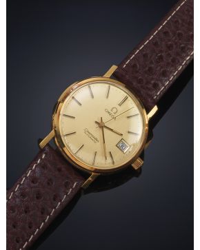 798-OMEGA SEAMASTER. AÑOS 60. CAJA LAMINADA EN ORO AMARILLO DE 18K. MOVIMIENTO AUTOMÁTICO. Esfera dorada con numeración a trazos aplicados. segundero cent