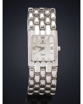 857-FESTINA. RELOJ DE PULSERA PARA SEÑORA. CAJA Y BRAZALETE EN ORO BLANCO DE 18K CON EL BISEL DE BRILLANTES. MOVIMIENTO SUIZO DE CUARZO. Esfera plateada c