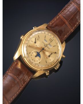 873-ULISSE NARDIN. CHRONO. CAJA EN ORO AMARILLO DE 18K. MOVIMIENTO AUTOMÁTICO. Esfera dorada con numeración a trazos aplicados y arábiga. tres esferas aux