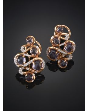 310-PENDIENTES CABUJONES DE AMATISTAS Y DETALLES DE BRILLANTES. Montura en oro rosa de 18k. 