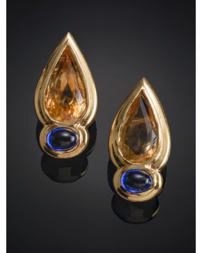 585-MODERNOS PENDIENTES DE CUARZOS AMARAILLOS EN FORMA DE LÁGRIMA Y PIEDRA AZUL . Montura en oro amarillo de 18k.