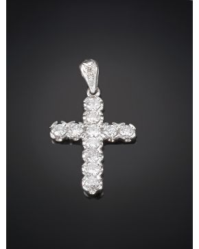 867-CRUZ COLGANTE DE BRILLANTES DE 0.40 CT APROX. Montura en oro blanco de 18k.