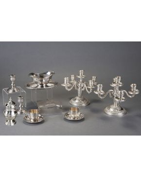 724-Pareja de candelabros de cinco luces en plata española punzonada. c. 1900. 