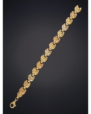 595-LOTE DE DOS PULSERAS EN ORO AMARILLO DE 18K.