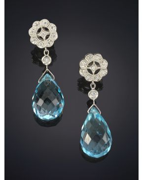 634-PENDIENTES LARGOS DE TOPACIOS TALLA BRIOLLETTE SUJETOS A UN ROSETÓN DE BRILLANTES. Montura en oro blanco de 18K.