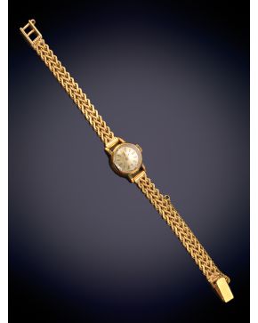 247-ELEGANTE RELOJ CYMA" DE PULSERA en oro amarillo de 18K."