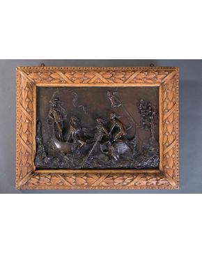 857-ESCUELA FRANCESA, S. XIX. Relieve en bronce pavonado con la representación de una escena mitológica.  Enmarcado con marco en madera tallada en su 