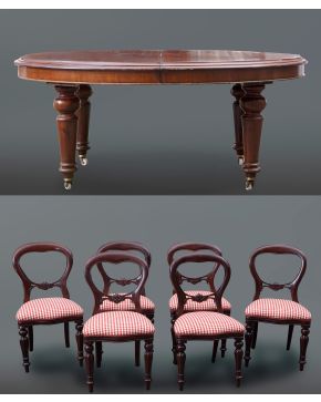 837-Mesa de comedor y seis sillas victorianas, s. XIX, en madera de caoba. Mesa de manivela con tablero ovalado con dos 