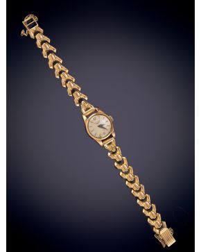 136-LONGINES. RELOJ DE PULSERA PARA SEÑORA AÑOS 40. CAJA Y BRAZALETE EN ORO AMARILLO DE 18K.