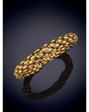 190-MODERNA PULSERA RÍGIDA DE ESLABONES EN ORO AMARILLO DE 18K.