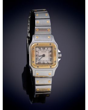 1015-CARTIER"" MODELO ""SANTOS. RELOJ DE PULSERA PARA SEÑORA, CAJA Y BRAZALETE EN ACERO Y ORO AMARILLO DE 18K. MOVIMIENTO SUIZO DE CUARZO. Esf