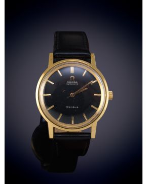 987-OMEGA"" RELOJ DE PULSERA AÑOS 50-60. CAJA EN ORO LAMINADA. MOVIMIENTO AUTOMÁTICO. Esfera negra con numeración a trazos aplicados en acero