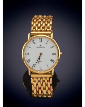 2359-MAURICE LACROIX" RELOJ DE PULSERA EN DORADO. MOVIMIENTO SUIZO DE CUARZO. Esfera blanca con numeración romana y agujas en esmalte negro 