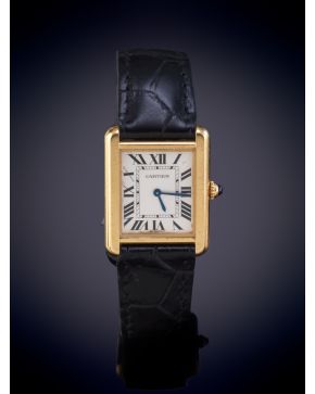 859-CARTIER RELOJ DE PULSERA CAJA EN ACERO Y ORO AMARILLO DE 18K. Esfera blanca con numeración romana en esmalte negro, 